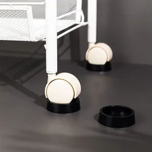 Black non-slip caster cups for furniture wheels shown under a white cart - 2 pieces