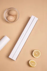 Dispenser magnetico bianco minimalista per pellicola trasparente con taglierina