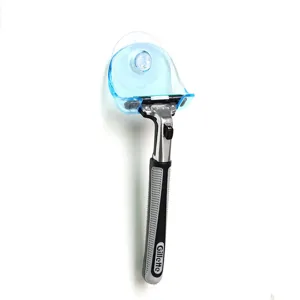 Minimalist transparent blue suction cup razor holder for bathroom wall storage organization