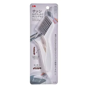 Professional window track and crevice cleaning brush with hard bristles in retail packaging.