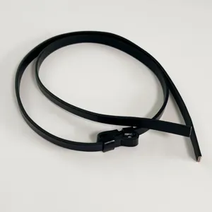 Detailed close-up of the black thin leather belt showing fine buckle and smooth texture.