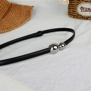 Elegant black thin waist belt with silver ball clasps detail, perfect for dresses and sweaters.