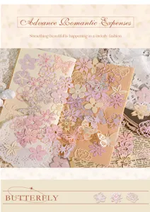 Detail shot of vintage lace paper flowers and butterflies for DIY journal scrapbooking crafts.