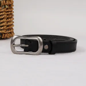 Detailed view of the vintage black leather belt with silver metal pin buckle, chic and elegant.