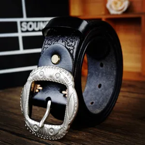 Vintage retro carved leather belt detail, classic silver metal pin buckle design.