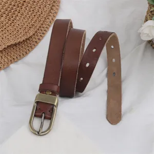 Women's genuine leather belt in deep brown with vintage metal pin buckle, retro casual style.