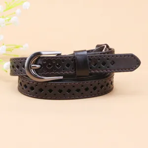 Dark brown women's leather belt detail, featuring chic silver buckle & diamond cutouts.