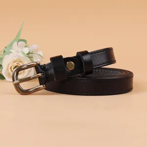 Classic women black leather belt with antique pin buckle, minimalist style for dresses.