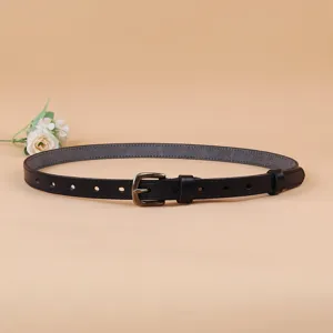 Women's slim black leather belt with vintage pin buckle, perfect for dresses and jeans styling.