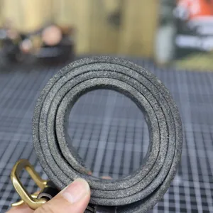Genuine leather belt detail, thick cowhide texture, vintage metal buckle, minimalist style.