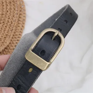 Genuine leather belt for women with retro metal buckle, casual stylish waist accessory for jeans.