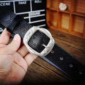 Vintage genuine leather belt for men with retro engraved pin buckle and embossed floral pattern.