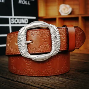 Vintage genuine leather men's belt with engraved metal buckle, stylish casual jeans belt.
