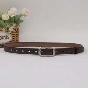 Classic brown leather belt for women and men with vintage metal pin buckle for casual wear.