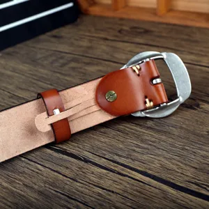 Vintage genuine leather men's belt detail view showcasing pin buckle and fine stitching craft.