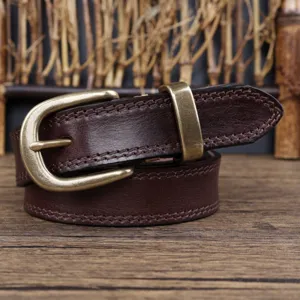 Vintage brown genuine leather womens belt with retro metal buckle for jeans style.