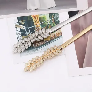 Elegant thin metal leaf waist chain elastic belt for women, perfect for dresses and sweaters.