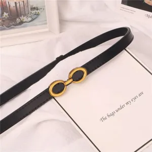 Elegante cinturón delgado de cuero negro con hebilla ovalada dorada para vestidos y abrigos
