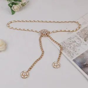 Elegant pearl waist chain for women, gold metal intertwined leather dress belt accessory.