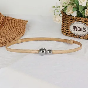 Chic beige skinny waist belt featuring stylish silver metal ball double buckle details.