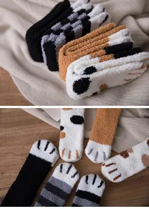 Cute fuzzy cat paw sleep socks for women, soft warm winter plush floor socks for home cozy wear.
