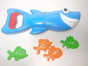 Detailed view of the shark grabber bath toy set, showing vibrant colors and fish toys clearly.