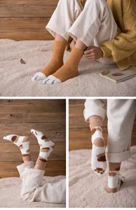 Cozy coral fleece fuzzy sleep socks for women, warm plush cat paw winter home floor socks.