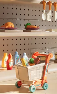 Children's toy shopping cart kitchen set detail view, featuring cute mini food and condiment bottles.