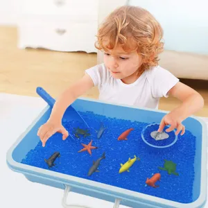 Details showing kids playing with water beads and ocean animal toys for fun DIY play.