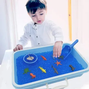 Children sensory water beads ocean toy set playing scene detail showing colorful sea animals.