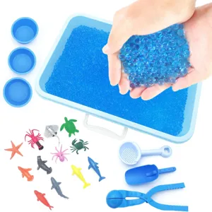 Children water beads toy set with tray, sea animal models and tools for sensory play and fun.