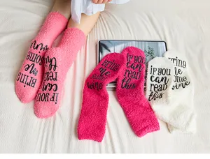 Cozy fuzzy coral fleece floor socks with fun letter print, warm winter women mid tube anti slip socks.