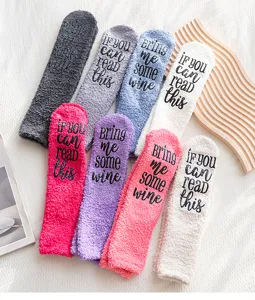 Cozy fuzzy coral fleece winter floor socks with funny letter print, warm and soft.