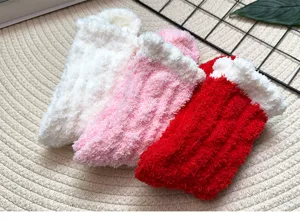 Detailed view of women's thick coral velvet mid-tube socks in white, pink and red colors.