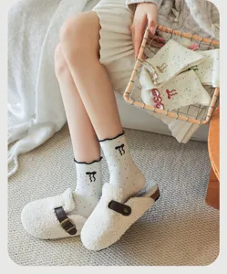 Cute women's mid-tube socks with sweet bows and colorful speckles, cozy Japanese style hosiery.