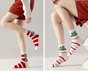 Red and white striped mid-calf socks with lucky Chinese embroidery for exam success.