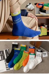 Men's cotton mid-tube sports socks with letter embroidery and side label, comfortable and breathable.