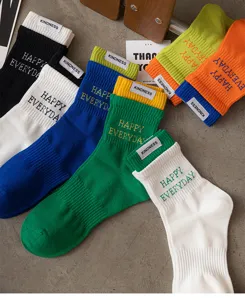 Colorful cotton mid-tube socks with ribbed cuffs and side label for men daily wear sports.