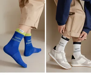 Men mid-tube cotton socks detail view featuring contrast ribbed cuffs and side label design.