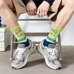 Streetwear mid-calf socks for men, trendy hip-hop letter print casual athletic cotton socks.