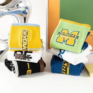 Street hip-hop mid tube socks for youth, trendy letter knit long socks, casual sports socks.
