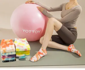 Tie-dye pilates grip socks for women, non-slip bottom, breathable cotton, ideal for yoga fitness.