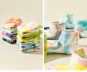 Close-up detail of colorful tie-dye short socks, soft cotton fabric, stylish yoga and floor socks.