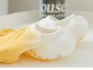 Detailed close-up view of professional non-slip Pilates socks with grip sole for fitness yoga.