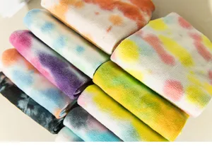 Tie-dye yoga socks detailed view, showing soft cotton texture and colorful pattern designs.
