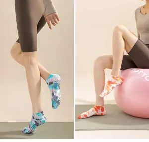 Women tie-dye pilates grip yoga socks detailed view, anti-slip bottom for fitness and home.