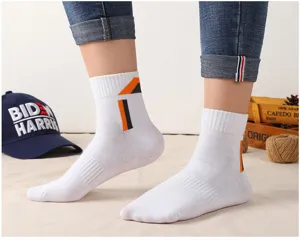 Men white mid-calf athletic socks with orange and black geometric blocks for running and sports