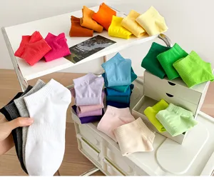 Detailed view of colorful women short socks, solid candy colors, soft low cut style.