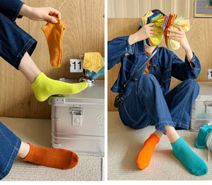 Detailed view of women's cotton boat socks featuring vibrant solid candy colors and soft texture.