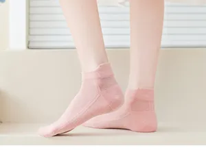 Detail view of breathable pink mesh low cut women socks, lightweight summer ankle hosiery.